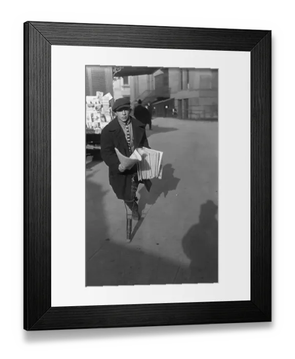 Framed Print : Newsboy with Wooden Leg Running to Make Sale Framed Print : Newsboy with Wooden Leg Running to Make Sale