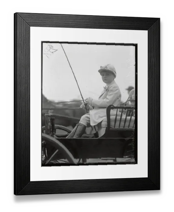 Framed Print : Boy Seated In Cart In Riding Gear Framed Print : Boy Seated In Cart In Riding Gear