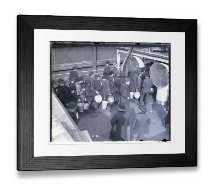 Framed Print : Immigrants in Line Holding Buckets Framed Print : Immigrants in Line Holding Buckets