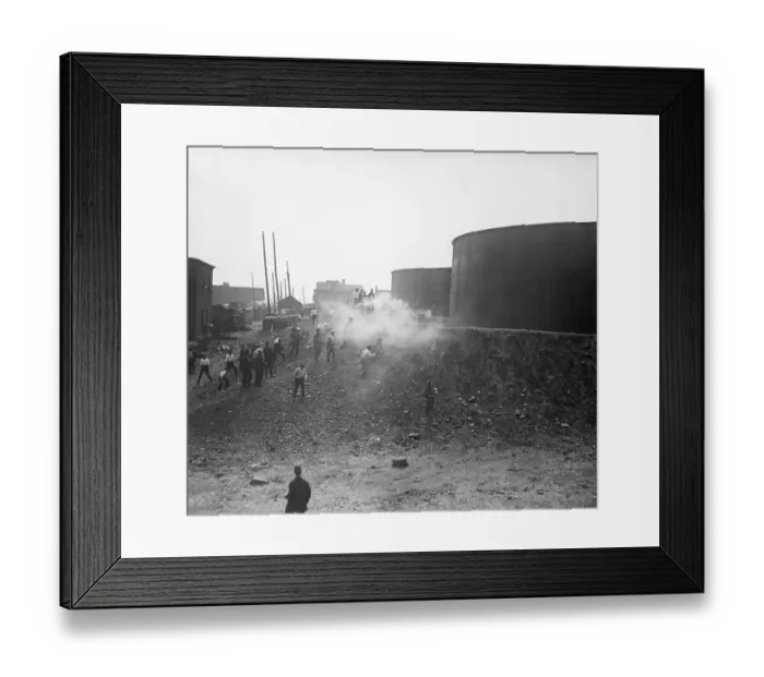 Framed Print : Strikers Behind Oil Tanks with Smoke from Guns Framed Print : Strikers Behind Oil Tanks with Smoke from Guns
