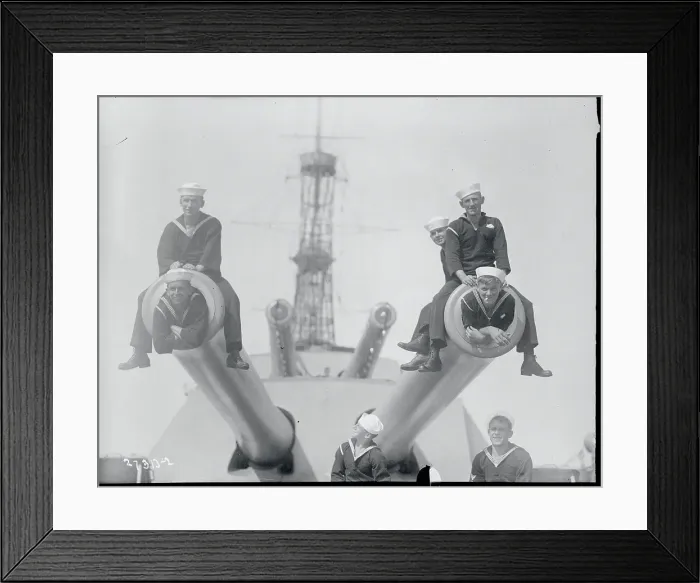 Framed Print : Sailor Sitting on Guns Framed Print : Sailor Sitting on Guns