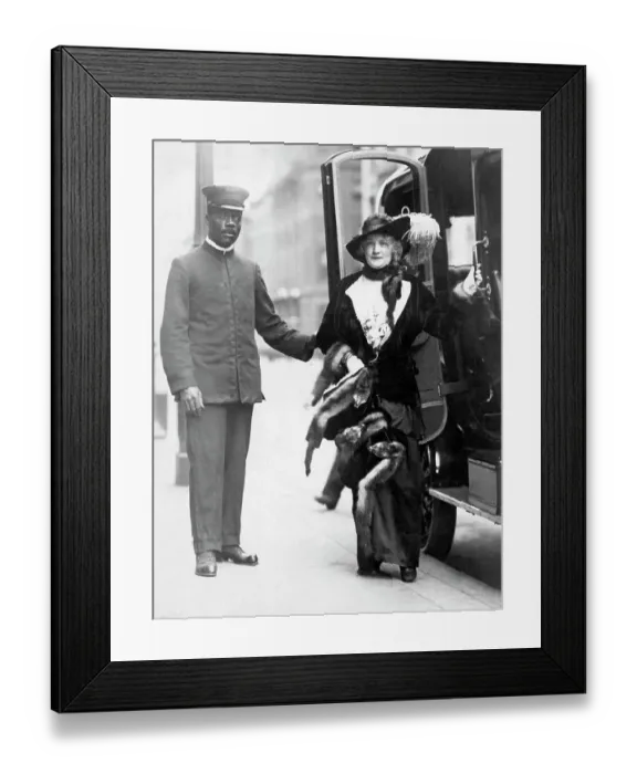 Framed Print : Chauffeur Helping Woman Out of Car Framed Print : Chauffeur Helping Woman Out of Car