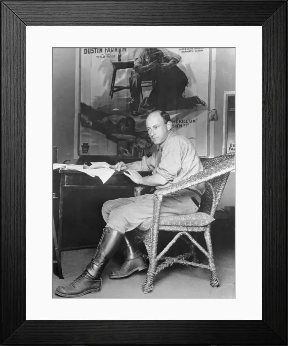 Framed Print : Younger Cecil B. DeMille Sitting at Desk
