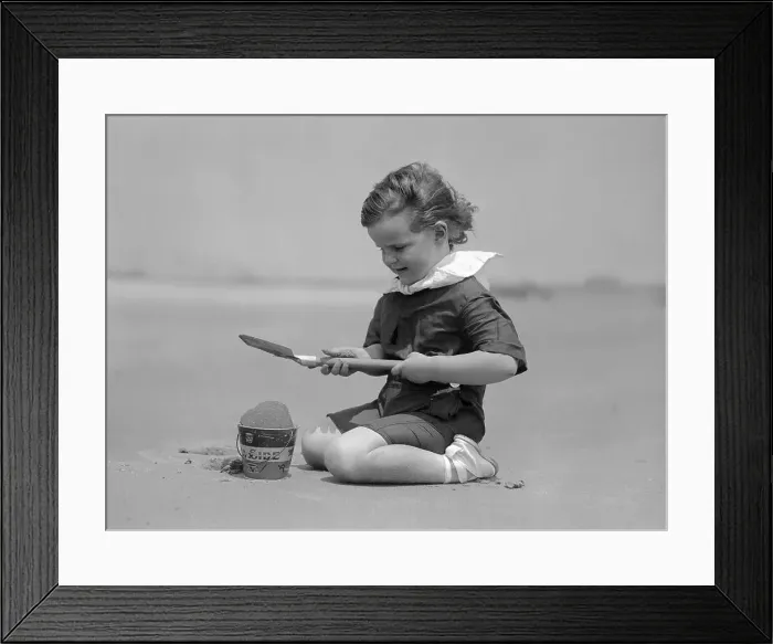 Framed Print : Girl (8-9 years) palying on beach. Narragansett, Rhode Island, USA. July 22, 1914 Framed Print : Girl (8-9 years) palying on beach. Narragansett, Rhode Island, USA. July 22, 1914