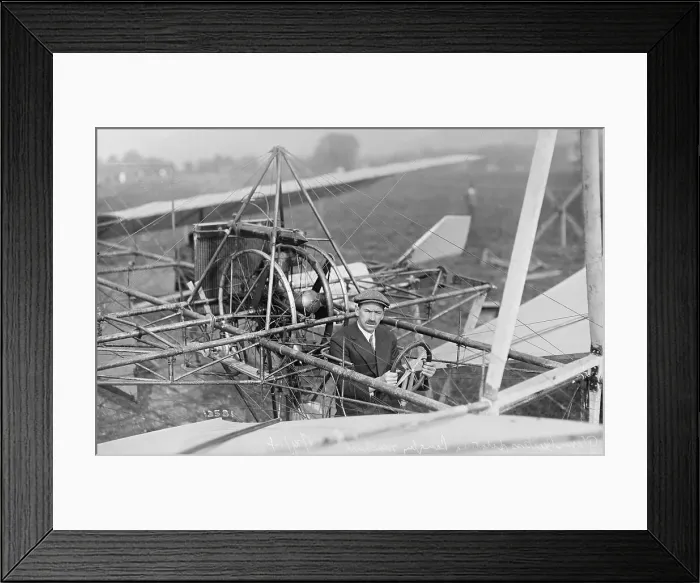Framed Print : Man Sitting in Early Aircraft Framed Print : Man Sitting in Early Aircraft
