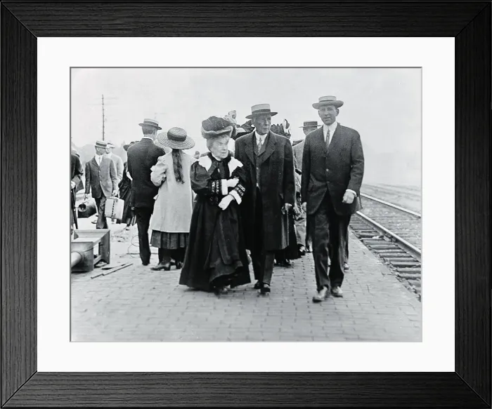 Framed Print : Mr. and Mrs. John D. Rockefeller Sr. Strolling at Train Station Framed Print : Mr. and Mrs. John D. Rockefeller Sr. Strolling at Train Station