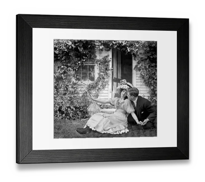 Framed Print : Couple Courting on Lawn of Ivy Covered House Framed Print : Couple Courting on Lawn of Ivy Covered House