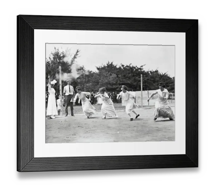 Framed Print : Women in Long Dresses Sprint in Race Framed Print : Women in Long Dresses Sprint in Race