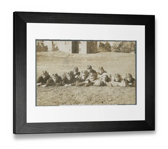 Framed Print : Football Team Posing on Grass Framed Print : Football Team Posing on Grass