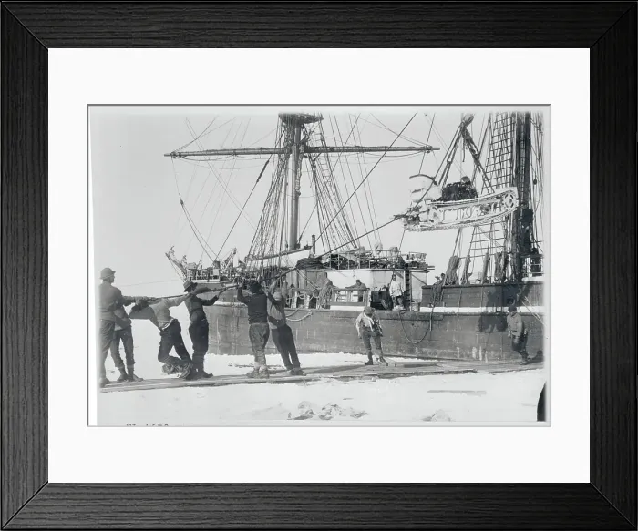 Framed Print : Men Lowering a Motor Sledge for Ship Framed Print : Men Lowering a Motor Sledge for Ship