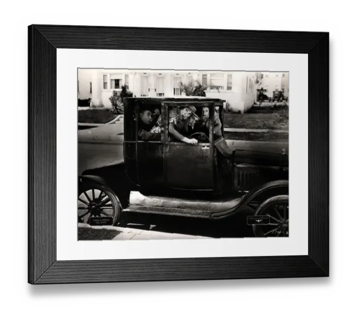 Framed Print : Passengers Packed in Old Car Framed Print : Passengers Packed in Old Car