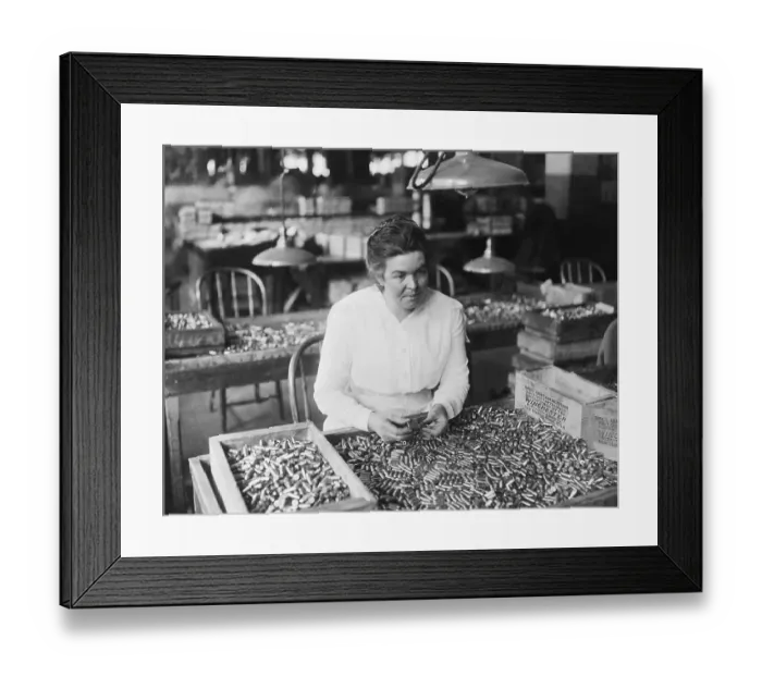 Framed Print : Woman Assembling Cartridges Framed Print : Woman Assembling Cartridges