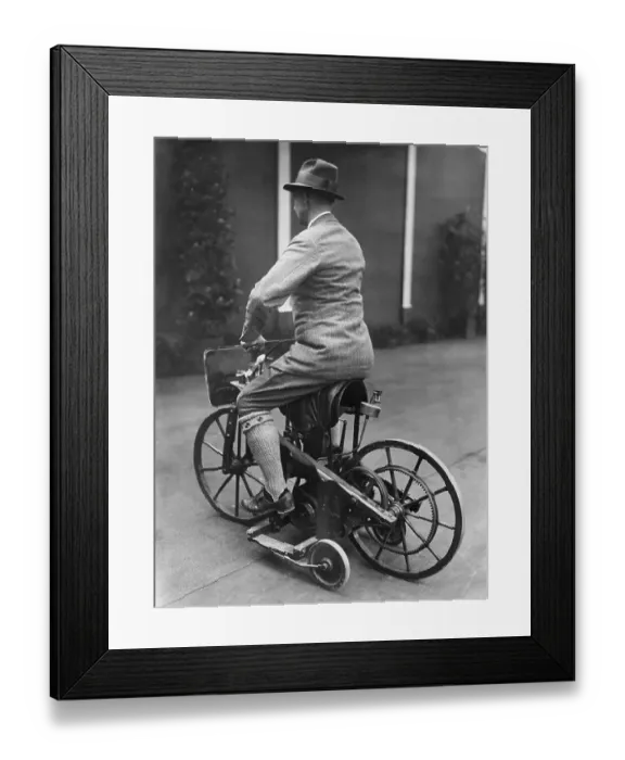 Framed Print : Man Riding Early Motorcycle