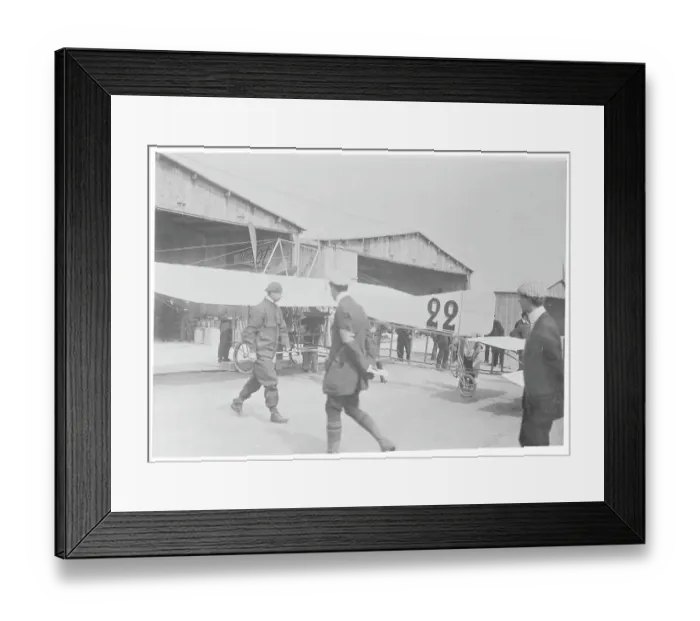 Framed Print : Aviator Louis Bleriot Checking His Airplane Before Flight Framed Print : Aviator Louis Bleriot Checking His Airplane Before Flight