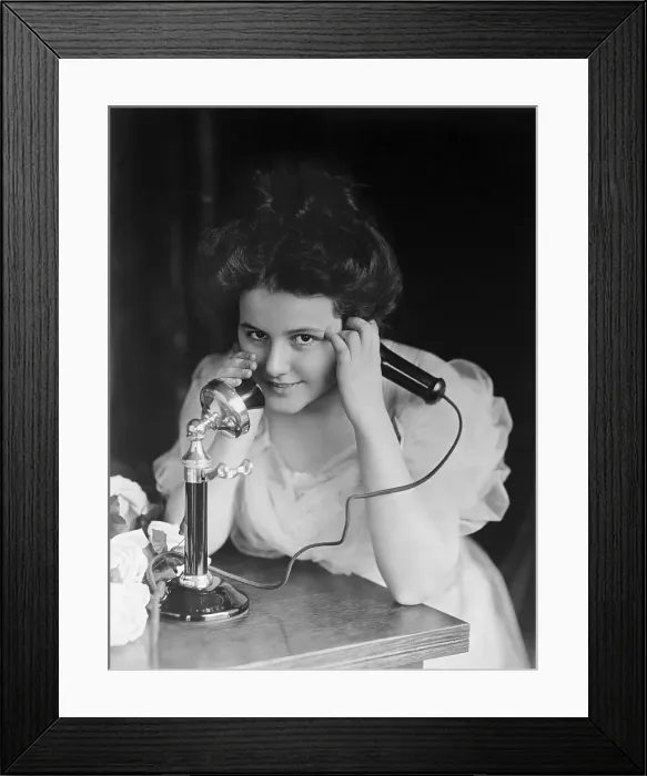 Framed Print : Young Lady Using Telephone Framed Print : Young Lady Using Telephone