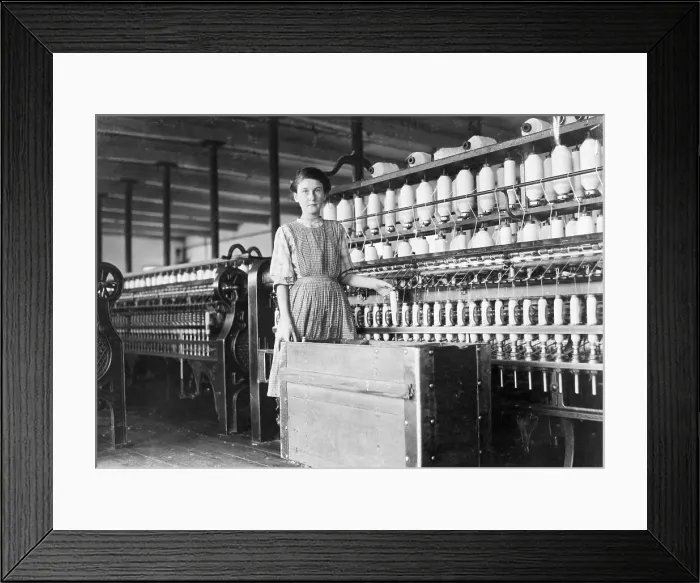 Framed Print : Girl Servicing Spindles In Factory Framed Print : Girl Servicing Spindles In Factory