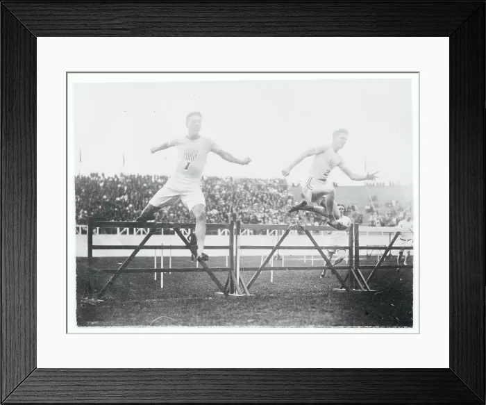 Framed Print : Athletes Jumping Hurdles Framed Print : Athletes Jumping Hurdles