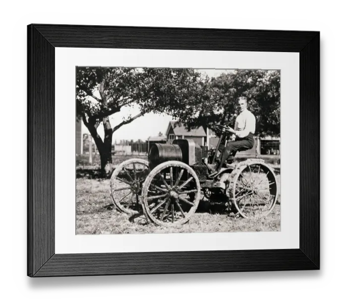 Framed Print : Henry Ford Sitting on Early Tractor