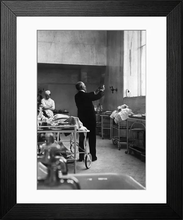 Framed Print : Dr. William Halsted Looking at X-Ray Framed Print : Dr. William Halsted Looking at X-Ray