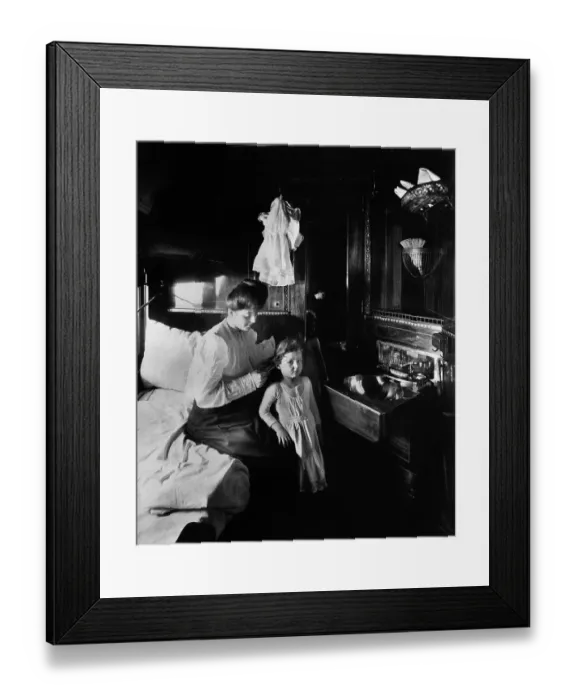 Framed Print : Mother Brushing Daughter's Hair on Train Framed Print : Mother Brushing Daughter's Hair on Train