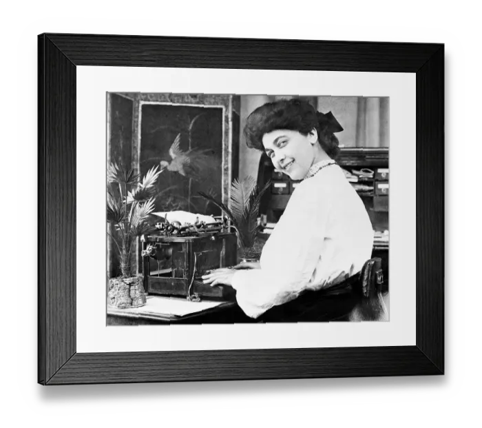 Framed Print : Secretary at Typewriter Smiling Framed Print : Secretary at Typewriter Smiling