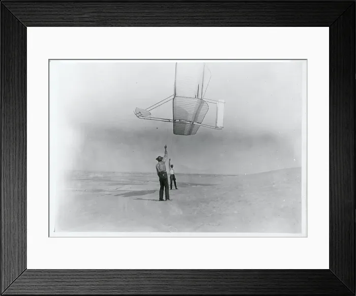 Framed Print : Dan Tate and Wilbur Wright Flying Glider Like a Kite Framed Print : Dan Tate and Wilbur Wright Flying Glider Like a Kite