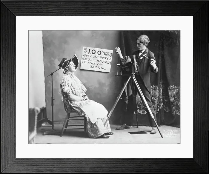 Framed Print : Photographer Taking Woman's Picture