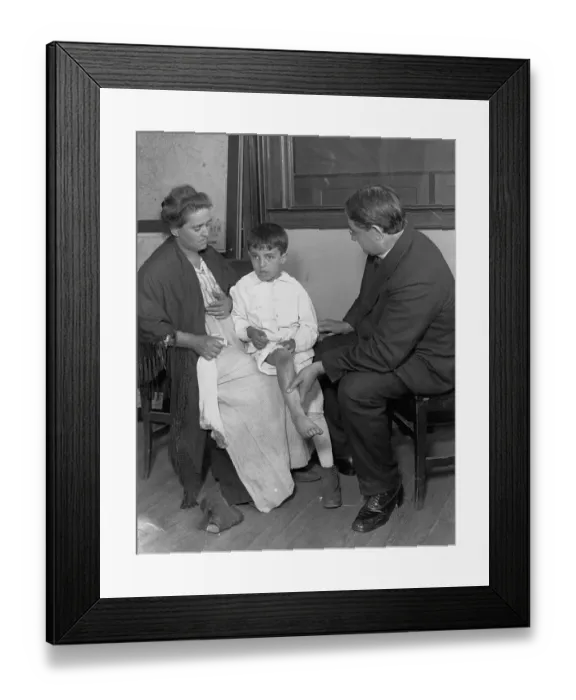 Framed Print : Doctor Examing Boy for Polio