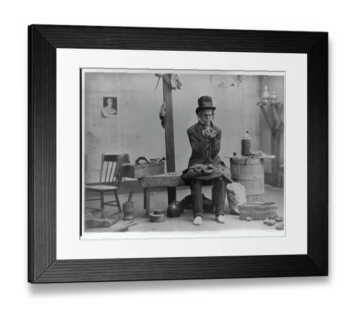 Framed Print : Man Sewing Button Framed Print : Man Sewing Button