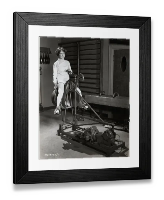 Framed Print : Womam Seated On Mechanical Bull Framed Print : Womam Seated On Mechanical Bull