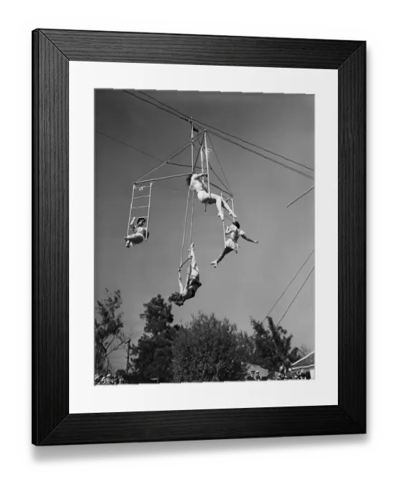 Framed Print : Female Trapeze Artists In Action