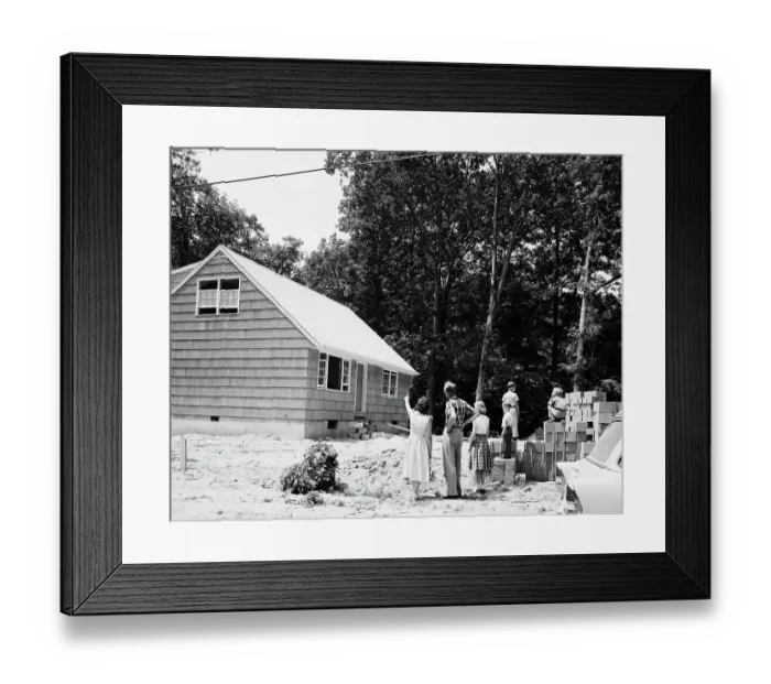 Framed Print : Family Surveys Construction of Home Framed Print : Family Surveys Construction of Home