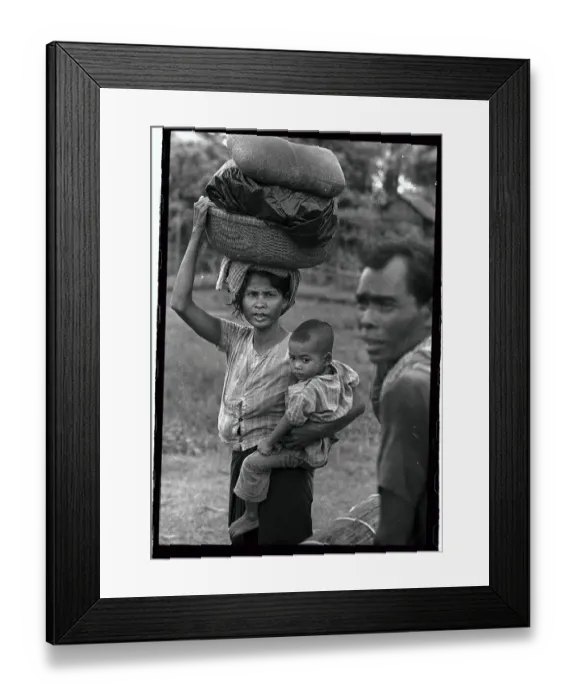 Framed Print : Family of Refugees Leaving War Torn Area Framed Print : Family of Refugees Leaving War Torn Area