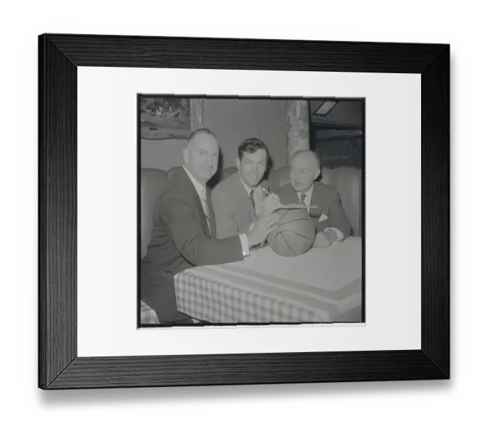 Framed Print : Bill Bradley and Basketball Officials Sitting with Basketball