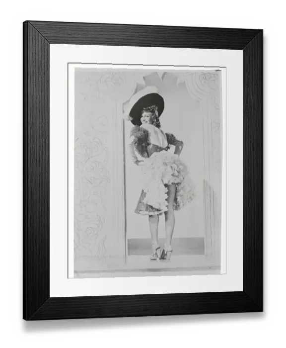 Framed Print : Rita Hayworth Lifting Her Skirt Framed Print : Rita Hayworth Lifting Her Skirt