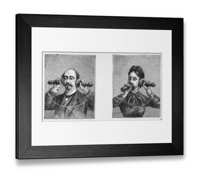 Framed Print : Man And Woman Using Old Fashioned Phones Framed Print : Man And Woman Using Old Fashioned Phones