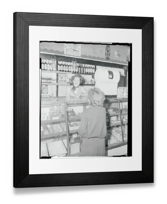 Framed Print : Woman Working at Delicatessen Framed Print : Woman Working at Delicatessen