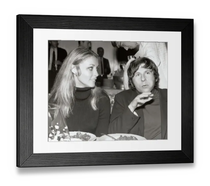 Framed Print : Roman Polanski and Sharon Tate Sitting at Table for Meal Framed Print : Roman Polanski and Sharon Tate Sitting at Table for Meal