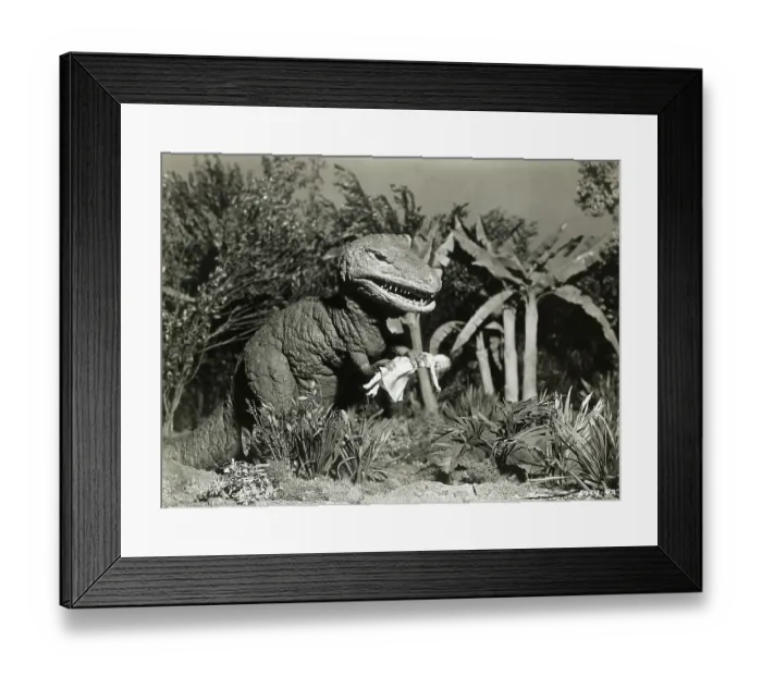 Framed Print : Tyrannosaurus-Like Monster Clutching Female Figure Framed Print : Tyrannosaurus-Like Monster Clutching Female Figure
