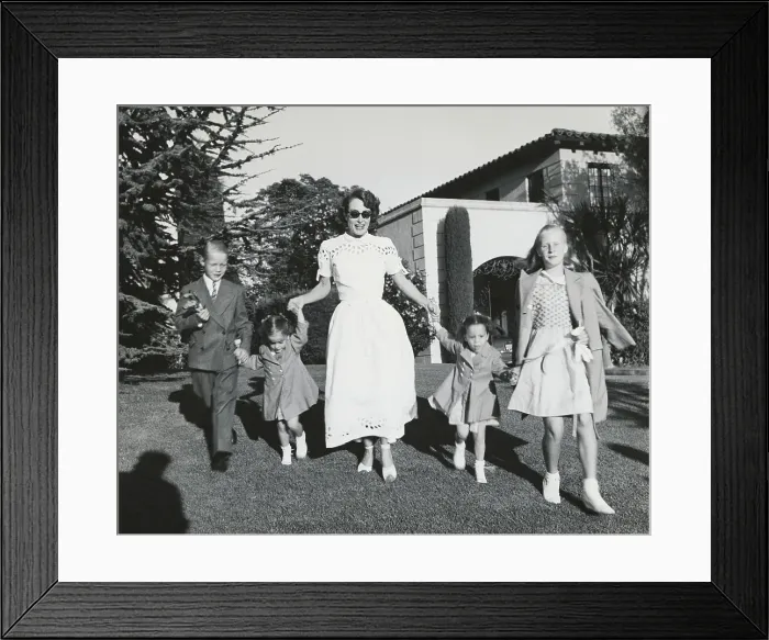 Framed Print : Joan Crawford Walking with Her Children Framed Print : Joan Crawford Walking with Her Children