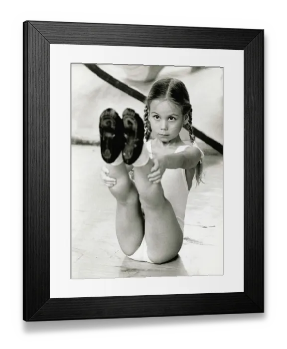Framed Print : Young Ballerina Balancing Framed Print : Young Ballerina Balancing