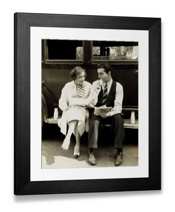 Framed Print : Irene Dunne and Robert Taylor Sitting on Car Framed Print : Irene Dunne and Robert Taylor Sitting on Car