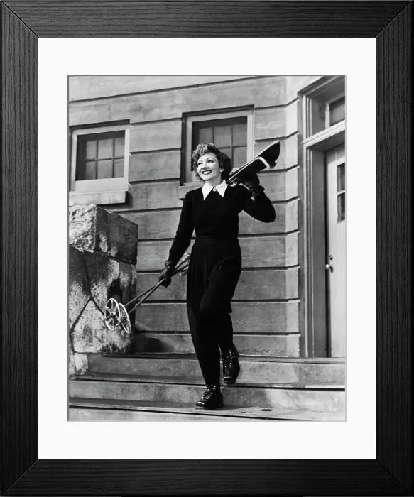 Framed Print : Claudette Colbert Carrying Ski Equipment Framed Print : Claudette Colbert Carrying Ski Equipment