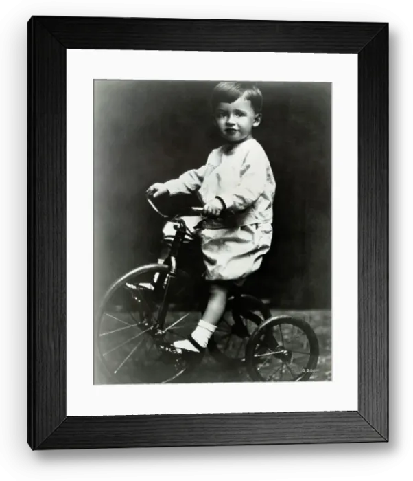 Framed Print : Young James Stewart Riding a Tricycle
