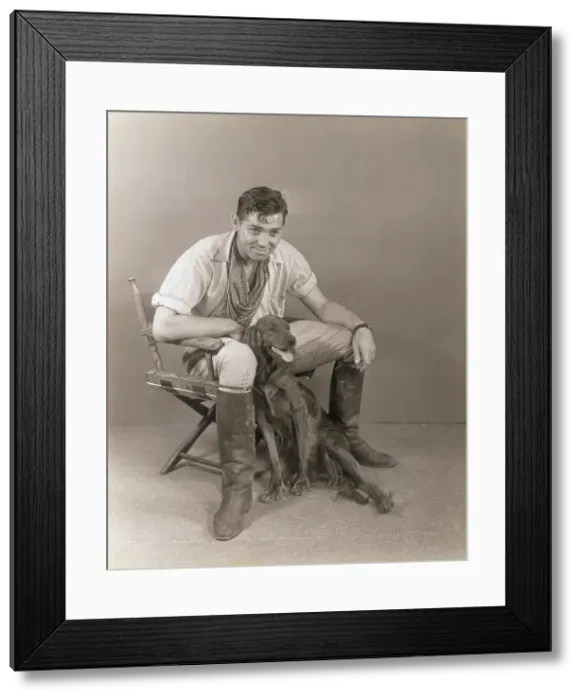 Framed Print : Clark Gable Posing With His Dog Framed Print : Clark Gable Posing With His Dog