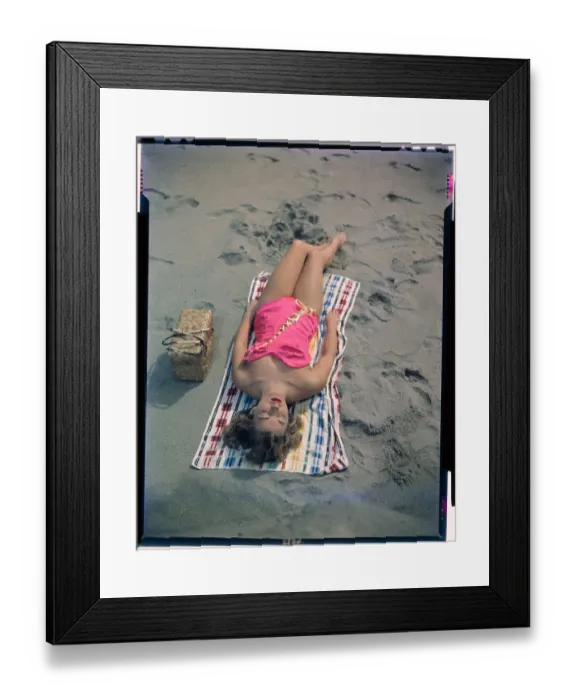 Framed Print : Pat Hall Lying on Beach Framed Print : Pat Hall Lying on Beach