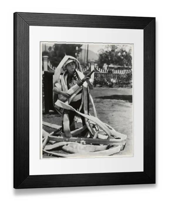 Framed Print : Fireman Tangled up by a Hose Framed Print : Fireman Tangled up by a Hose