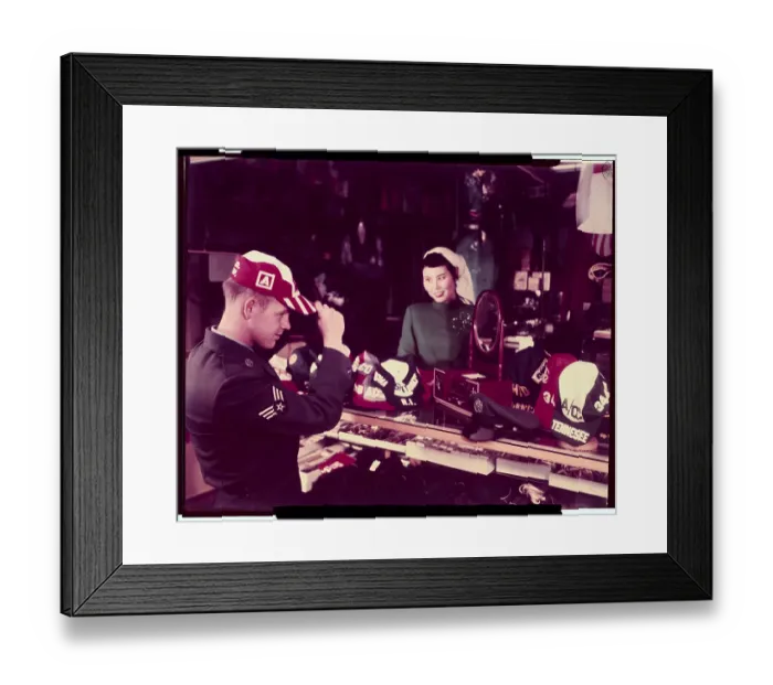 Framed Print : Pilot Trying on Military Cap Framed Print : Pilot Trying on Military Cap