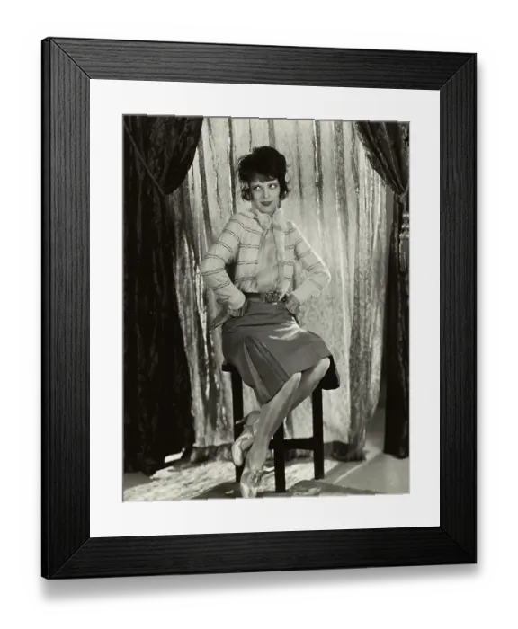 Framed Print : Actress Clara Bow Sitting on a Stool Framed Print : Actress Clara Bow Sitting on a Stool
