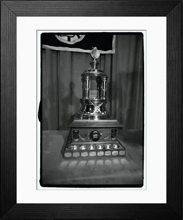Framed Print : Hockey Trophy Standing on Table Framed Print : Hockey Trophy Standing on Table